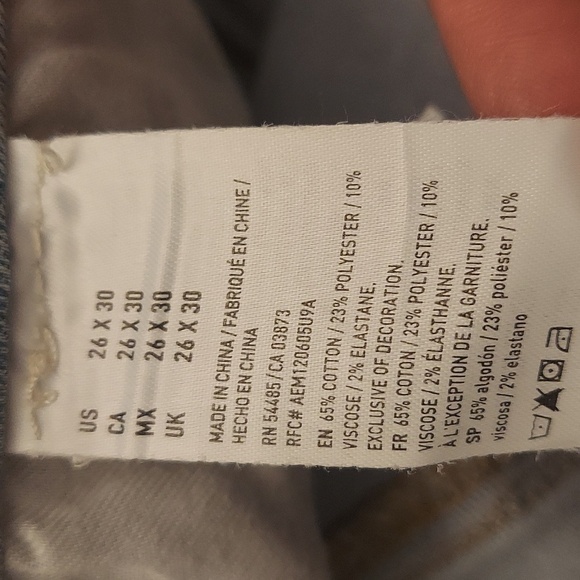 AMERICAN EAGLE OUTFITTERS Extreme Flex Light Blue Wash Distressed Skinny Jeans - Picture 12 of 14